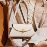 纽芝兰女包新款INS设计风格珍珠包单肩斜跨包包(米绸色)