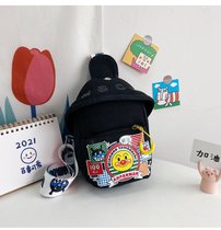 儿童帆布小包包2021夏季新款潮时尚幼儿园卡通单肩斜跨胸包学生包(款一单卡通黑色 默认版本)