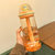 可爱儿童吸管水杯女生高颜值创意水瓶ins风学生外带便携杯子塑料(橙色580ml)