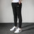 NIKE耐克男裤 2019秋季新款裤子休闲运动裤跑步训练健身针织透气收口小脚裤(黑色 XL)