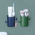 卫生间牙刷置物架壁挂式沥水免打孔浴室洗漱台梳子牙膏筒收纳筒(两个装（蓝+绿）)