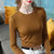 MISS LISA莫代尔t恤时尚圆领薄款长袖打底衫纯色弹力内搭上衣J1D2213(焦糖色 L)