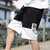 2020夏季新款男士休闲裤子男韩版潮流五分裤黑色短裤男宽松 BKL-K521(白色 4XL)