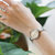 天梭(TISSOT)瑞士手表 弗拉明戈系列 贝母盘女表 时尚潮流小巧简约石英腕表T094.210.11.111.00(白盘银钢带)第4张高清大图