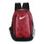 涂鸦耐克双肩包男女款背包学生书包电脑包休闲运动旅行包(迷彩红)