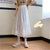 半身裙2021新款春夏季中长款高腰A字裙设计感荷叶边初恋白色裙子(白色7864 M)