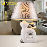 汉斯威诺 陶瓷台灯 卧室床头灯 现代简约创意时尚可爱温馨田园灯具(白兔带光源（HS203011）)