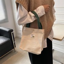 秋季手提袋2021新款上班包包女帆布包通勤简约带饭盒包小拎手拎包(白色 默认版本)